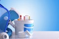 Chemical cleaning products and tools for pool blue background Royalty Free Stock Photo