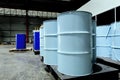 Chemical containment 200 liters tanks stored in chemical storage area in the factory warehouse. Can be use as background of any co