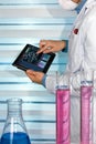 Chemical engineer working with tablet in chemistry laboratory Royalty Free Stock Photo