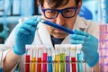 Chemical engineer working with test tubes in the research laboratory Royalty Free Stock Photo