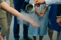 Chemical event at the birthday party: children's hands touch the smoke from liquid nitrogen