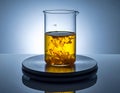 Chemical Experiment with Beaker and Yellow Liquid on Scale Royalty Free Stock Photo