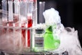 Chemical experiment: smoke comes out of the vessel, tubes Royalty Free Stock Photo