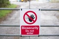 Chemical factory biosecurity sign warning dangerous hazard at entrance gate