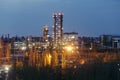 Chemical factory at summer night. Rectification towers Royalty Free Stock Photo