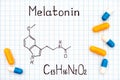 Chemical formula of Melatonin with some pills Royalty Free Stock Photo