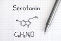 Chemical formula of Serotonin with pen.