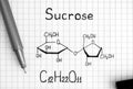 Chemical formula of Sucrose with black pen