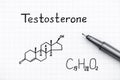 Chemical formula of Testosterone with pen. Royalty Free Stock Photo