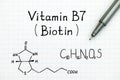 Chemical formula of Vitamin B7 Biotin with pen Royalty Free Stock Photo