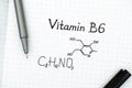 Chemical formula of Vitamin B6 with pen Royalty Free Stock Photo