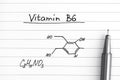 Chemical formula of Vitamin B6 with pen. Royalty Free Stock Photo