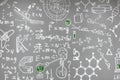 Chemical formulas drawn on the gray wall