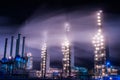 Chemical industry distillation towers detail at night. Petrochemical background. Long exposure at winter dusk. Royalty Free Stock Photo