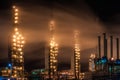 Chemical industry distillation towers detail at night. Petrochemical background. Long exposure at winter dusk. Royalty Free Stock Photo