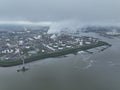 Chemical industry at terneuzen. DOW chemical park and petrochemical storage containers. Smokestacks and heay industry