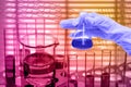 Chemical Laboratory,Hand holding the tube with test flask Royalty Free Stock Photo