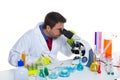 Chemical laboratory scientist man looking microscope Royalty Free Stock Photo