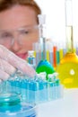 Chemical laboratory scientist woman with bottles Royalty Free Stock Photo