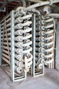 Chemical plant interior with equipment. Double Pipe Heat Exchanger or hairpin heat exchanger with longitudinal fins as