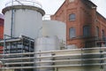 Chemical plant with modern production and old brick factory building Royalty Free Stock Photo