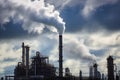 chemical plant, with smoke and steam billowing from the stacks Royalty Free Stock Photo