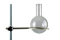Chemical round-bottom flask mounted on a stand isolated on a white background