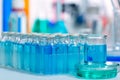 Chemical scientific laboratory blue glass bottles Royalty Free Stock Photo