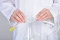 Chemical substance pouring and mixing, Laboratory and science experiments, Oil formulating the chemical Royalty Free Stock Photo