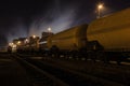 Chemical train in depot at night