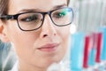 Chemist analyzing result of experiment Royalty Free Stock Photo