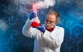 Chemist carefully oversees his experiment Royalty Free Stock Photo