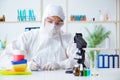 The chemist checking and testing plastic dishes