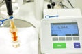 A chemist conducts a study of the stiffness of the solution. Laboratory PH measurement. A device for measuring PH