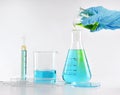 Chemist formulating dangerous solution substances, Scientist with equipment and science experiments. Royalty Free Stock Photo