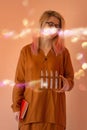 Chemist girl student holds a test tube. Student scientist with glass equipment