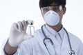 Chemist in laboratory checking test tubes. Royalty Free Stock Photo