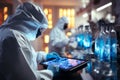 Chemist in PPE leads a lab team using high tech tech for COVID research