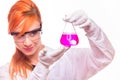 Chemist woman holding a test tube in a lab