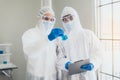 Chemist working for research and testing in laboratory together,Covid-19,Coronavirus vaccine Royalty Free Stock Photo