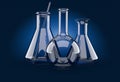 Chemistry flasks on blue background