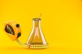 Chemistry flasks with measuring tape Royalty Free Stock Photo