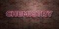 CHEMISTRY - fluorescent Neon tube Sign on brickwork - Front view - 3D rendered royalty free stock picture