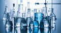Chemistry Lab Glassware with Blue Solutions Royalty Free Stock Photo