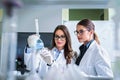 Young female researchers conducting laboratory test