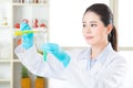 Chemistry researchers observing indicator color shift Royalty Free Stock Photo