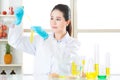 Chemistry researchers observing indicator color shift Royalty Free Stock Photo