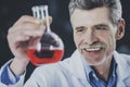 Chemistry or science concept. Senior chemistry professor working in laboratory