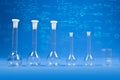 Chemistry science - flasks on blue background Royalty Free Stock Photo