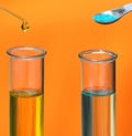 Chemistry testing test tubes with dropper and chemicals Royalty Free Stock Photo